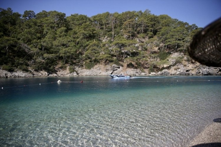 Muğla’nın mavi bayraklı plajına ağır ilgi